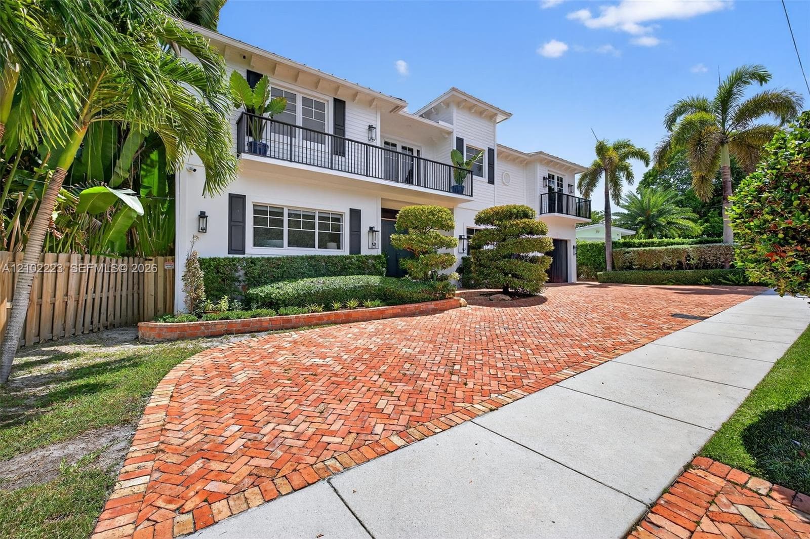 A grand exterior presence complemented by a sweeping circular brick paver driveway, a spacious two car garage and ample additional parking for guest, beautiful Tropical landscaping and timeless, architectural detail details complete this impressive Rio Vista residence, perfectly suited for both every day, convenience and gracious entertaining.