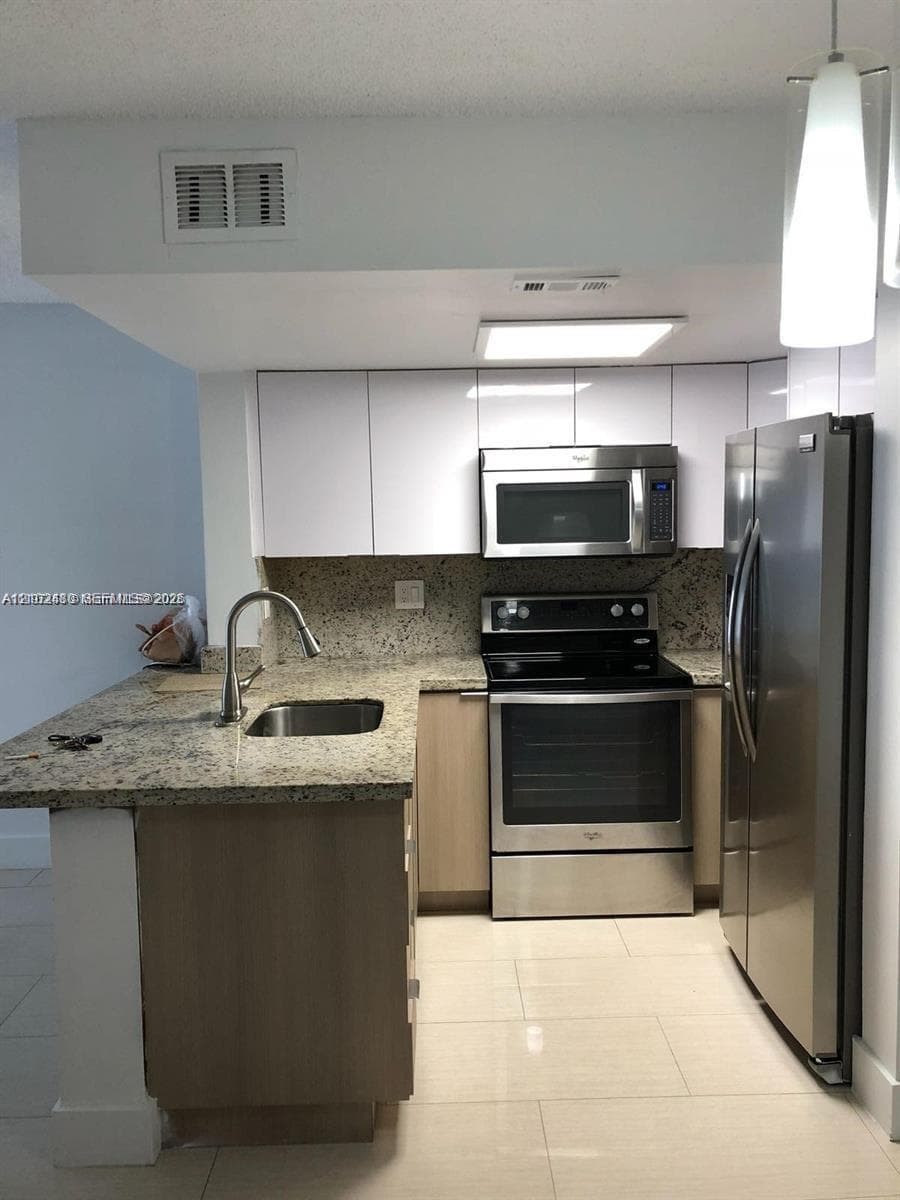 CORAL POINTE TOWNHOMES CO · #4-208 in Miami - Photo 6