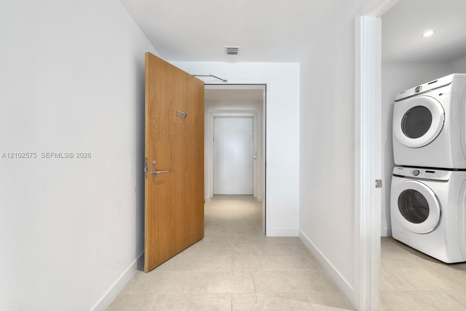 Private elevator foyer & laundry room