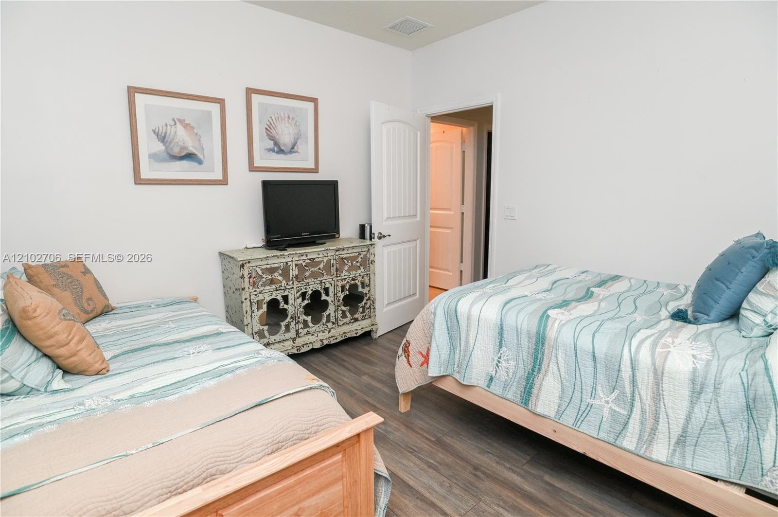 Wood-finish flooring and a multi-panel interior door