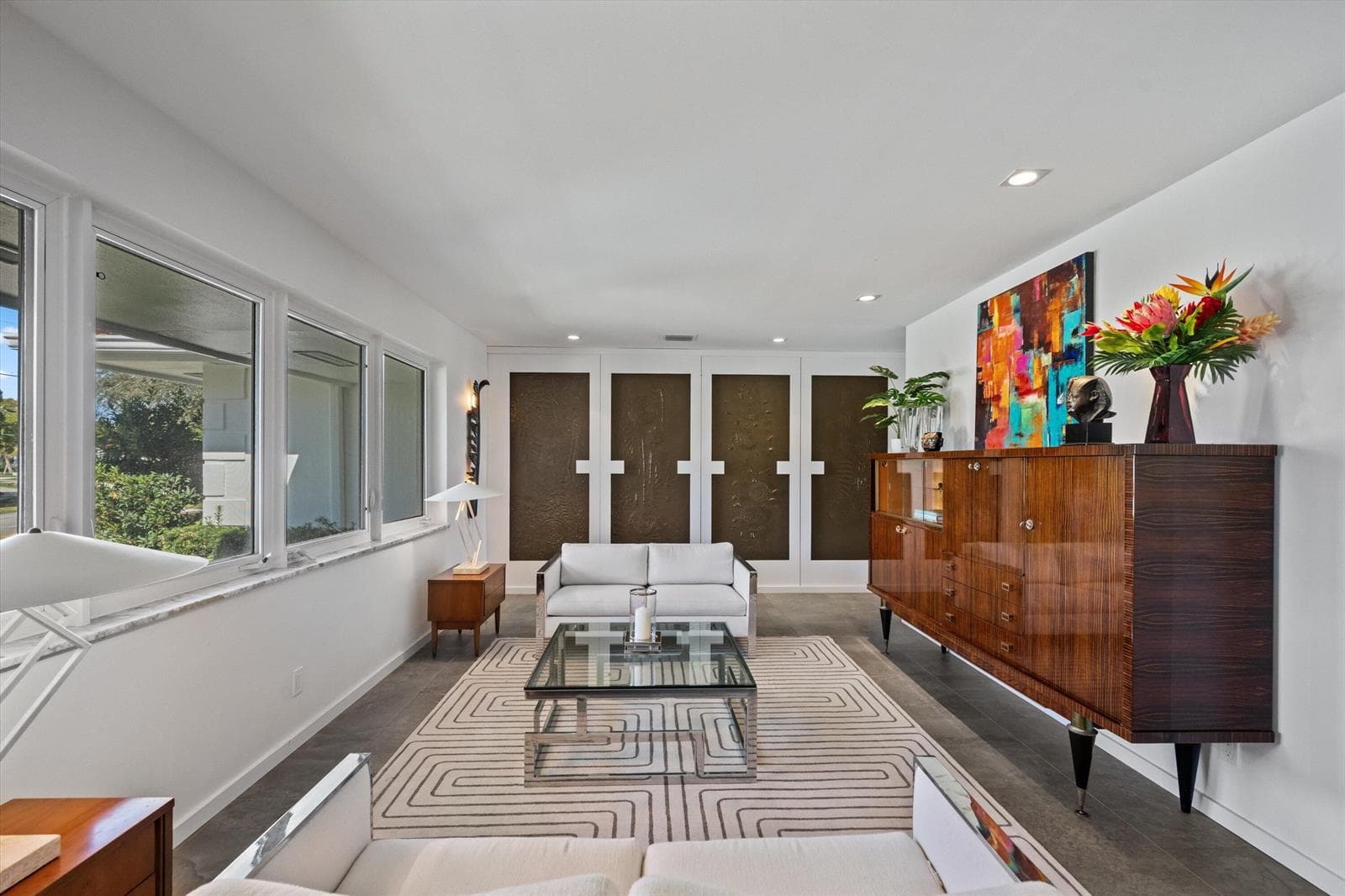 Stylish den with decorative glass panles