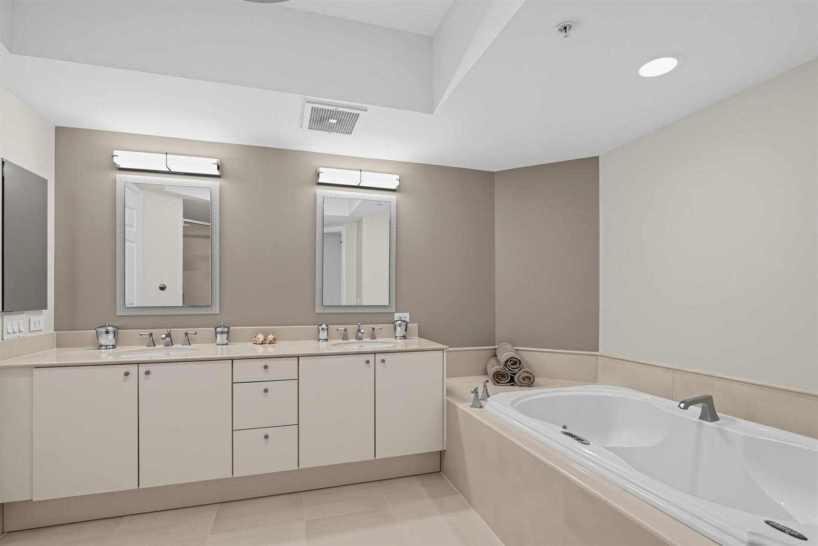 Double Sinks in marble Primary Bath