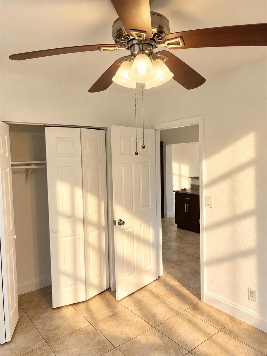 Sunlit Room with Ceiling Fan
