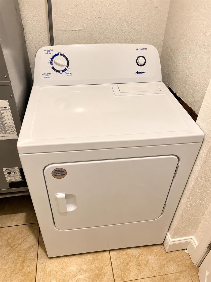 Amana Dryer in a Warm Laundry Nook