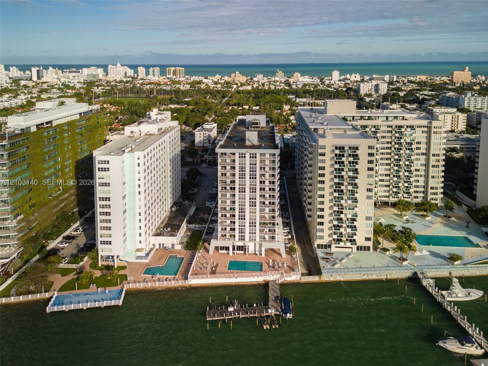 High-rise coastal property featuring waterfront access, private boat docks, and swimming pools