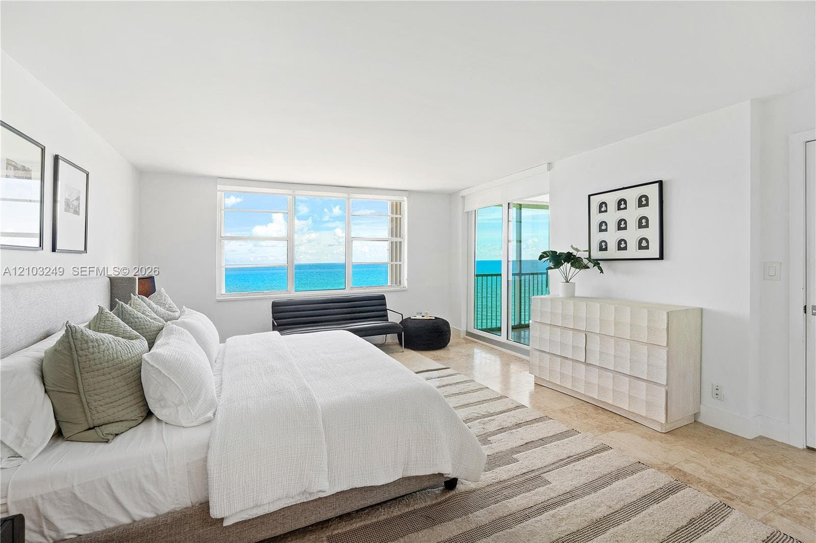 Primary Bedroom with sitting area and ocean views to the east and the south