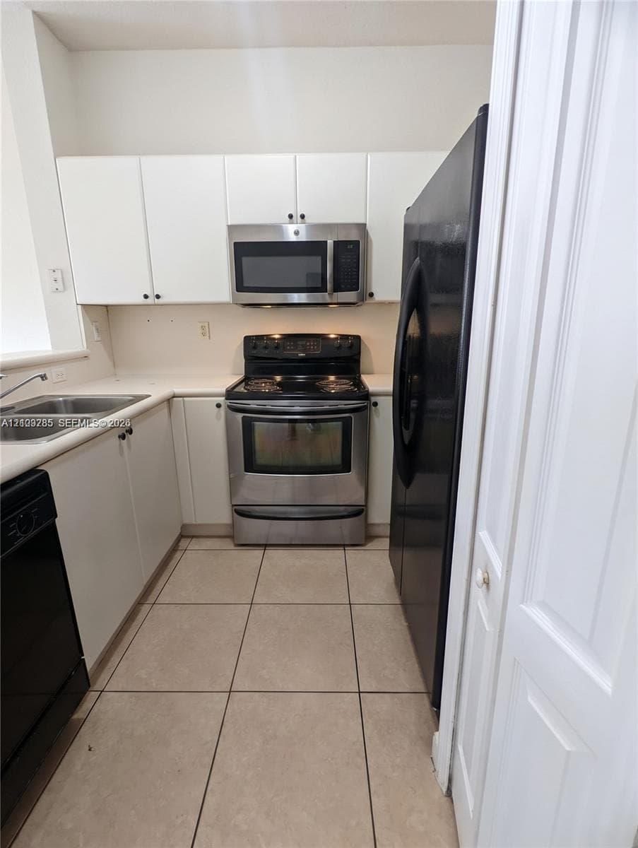 SHOMA HOMES AT COUNTRY CL · #208-18 in Hialeah - Photo 6