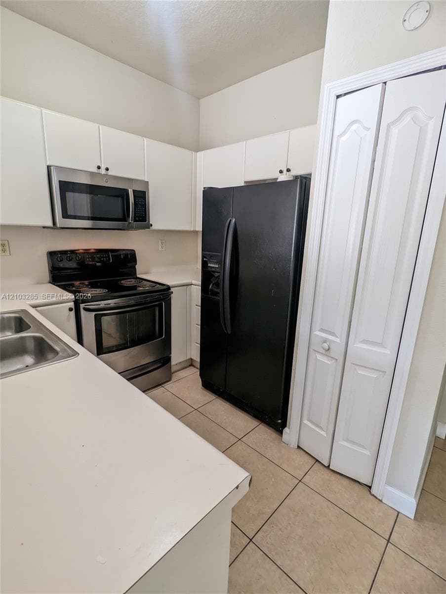 SHOMA HOMES AT COUNTRY CL · #208-18 in Hialeah - Photo 5