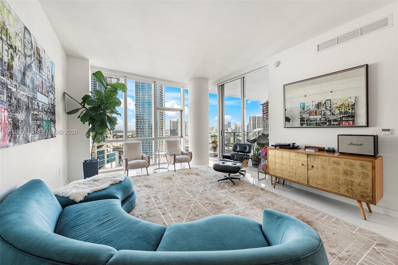 Floor-to-ceiling windows, white tile flooring, sliding glass door, white walls, and recessed lighting