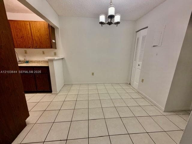Tiled flooring extending throughout the space