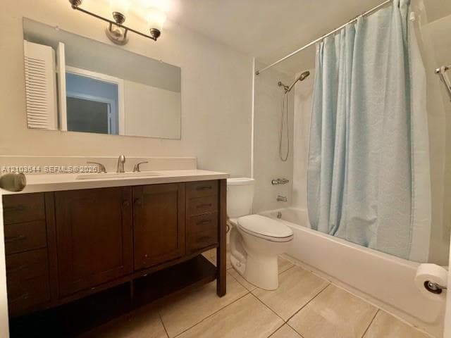 Bathroom featuring a dark wood-finish vanity with an integrated sink, polished chrome faucet, rectangular mirror, and a full bathtub with shower