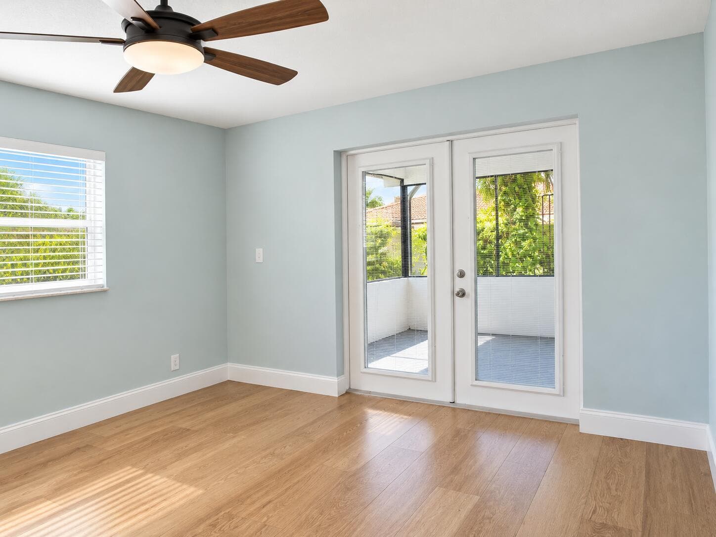 Bright Main Bedroom with Screened Patio