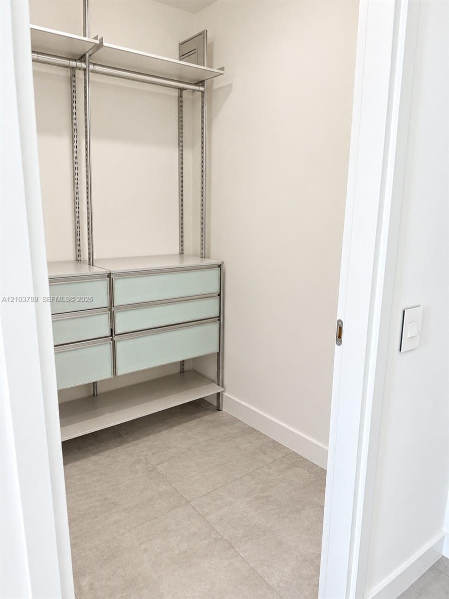Primary walk-in closet 1
