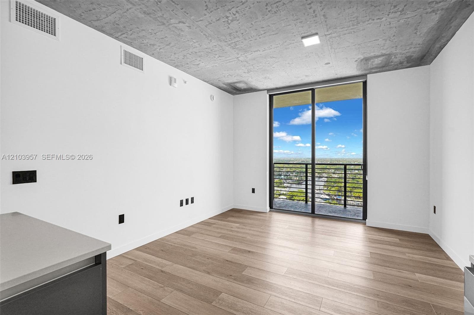 White walls with wood-finish flooring