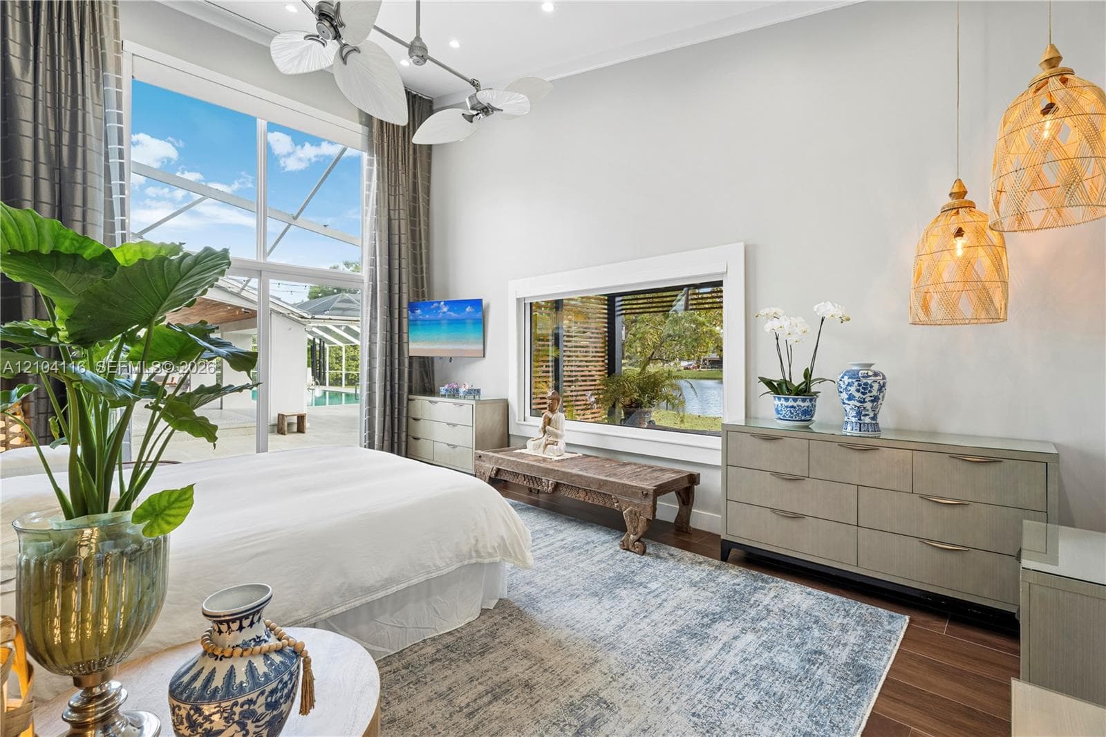 Spacious primary with the best view of the house on the canal.