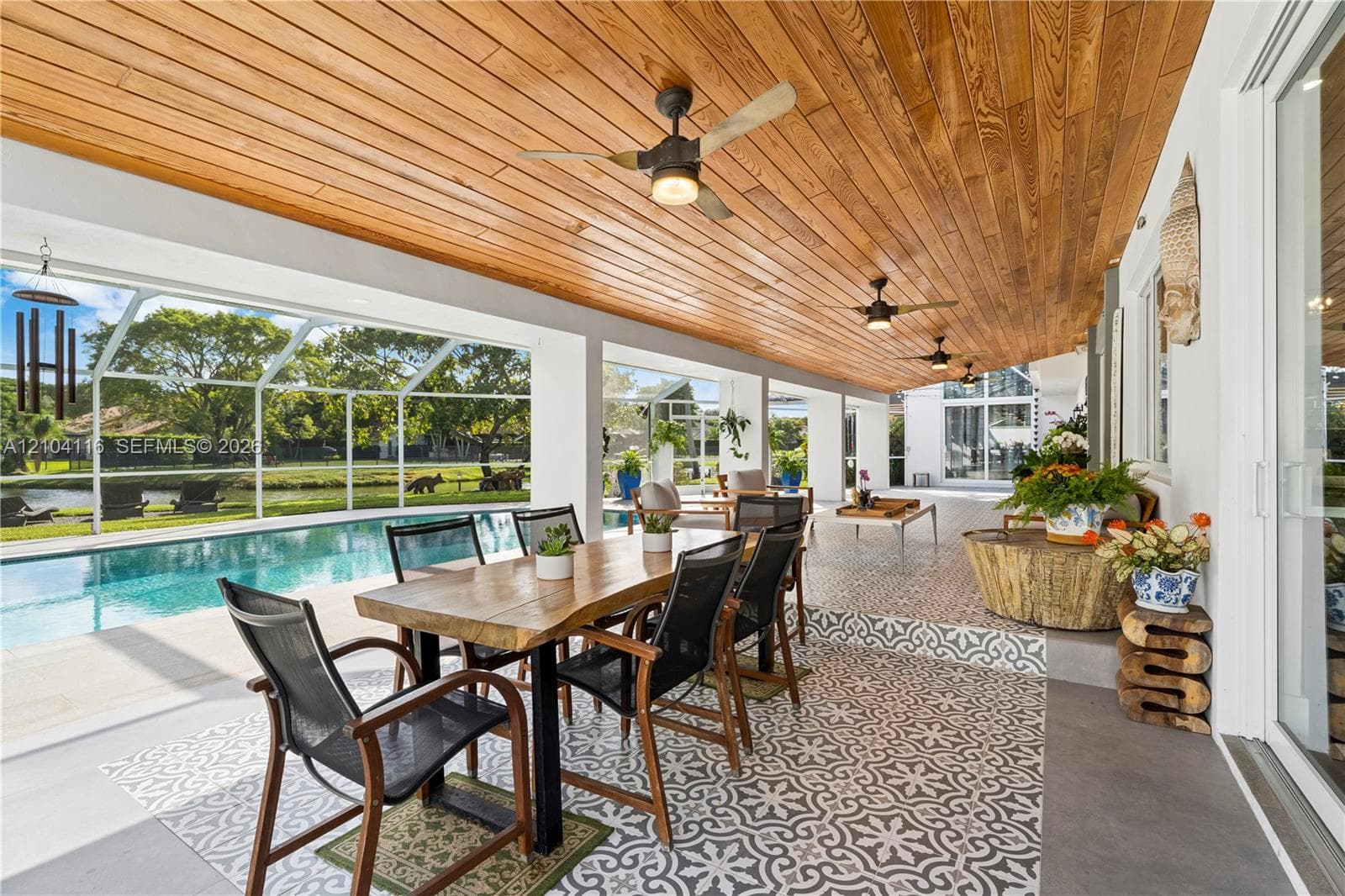 Beautiful covered patio with great space for entertaining and an outdoor kitchen