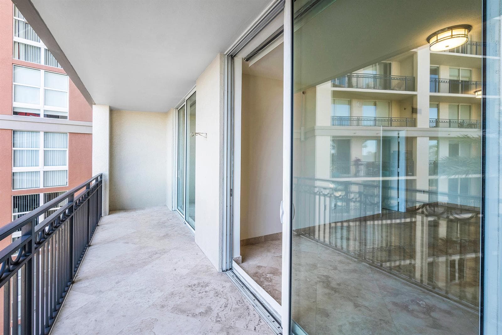 Impact Glass & Dual Entrance Balcony