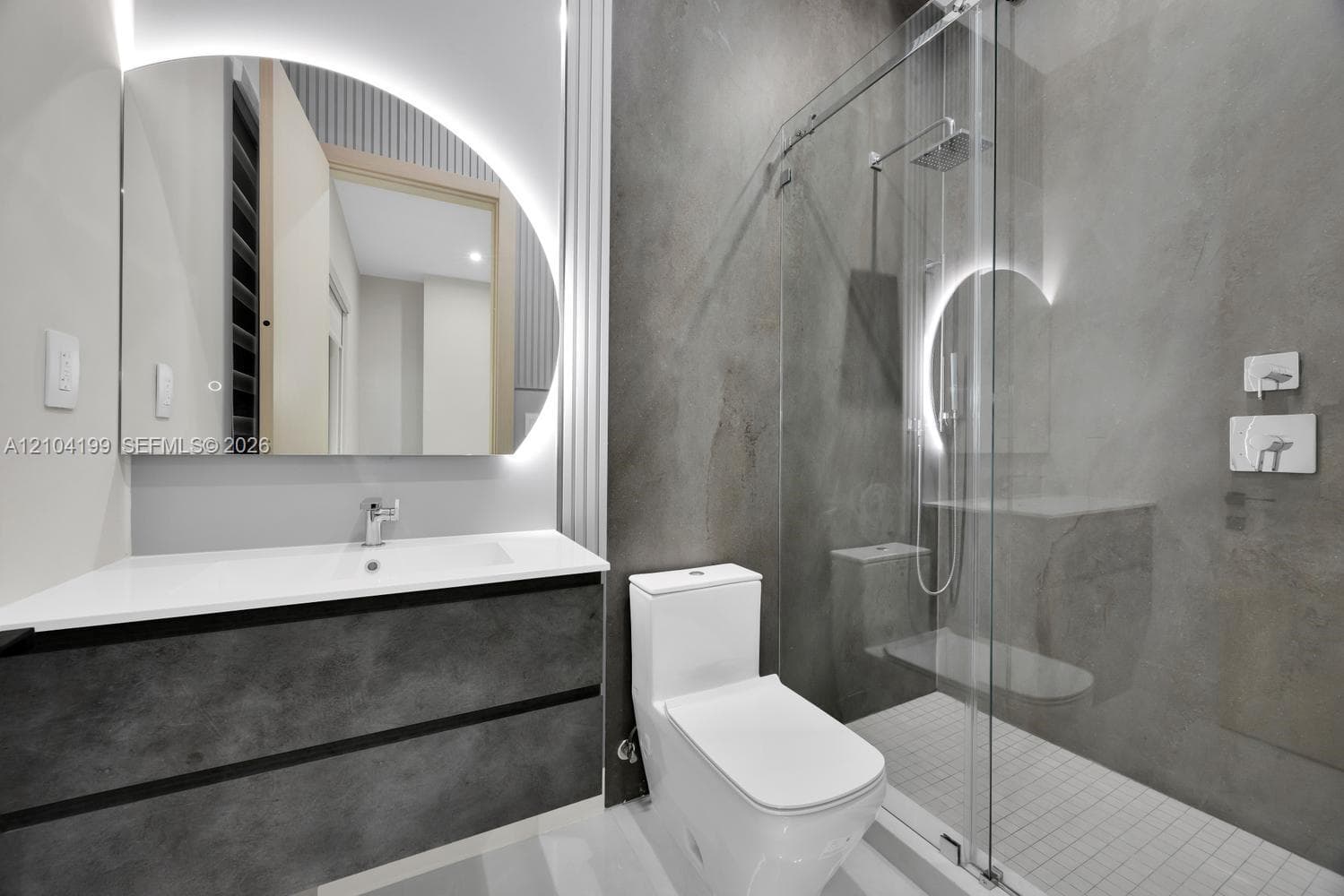 Exterior featuring an expansive stone patio, a multi-section swimming pool with integrated spa, floor-to-ceiling glass wall systems, and low-profile recessed exterior lighting