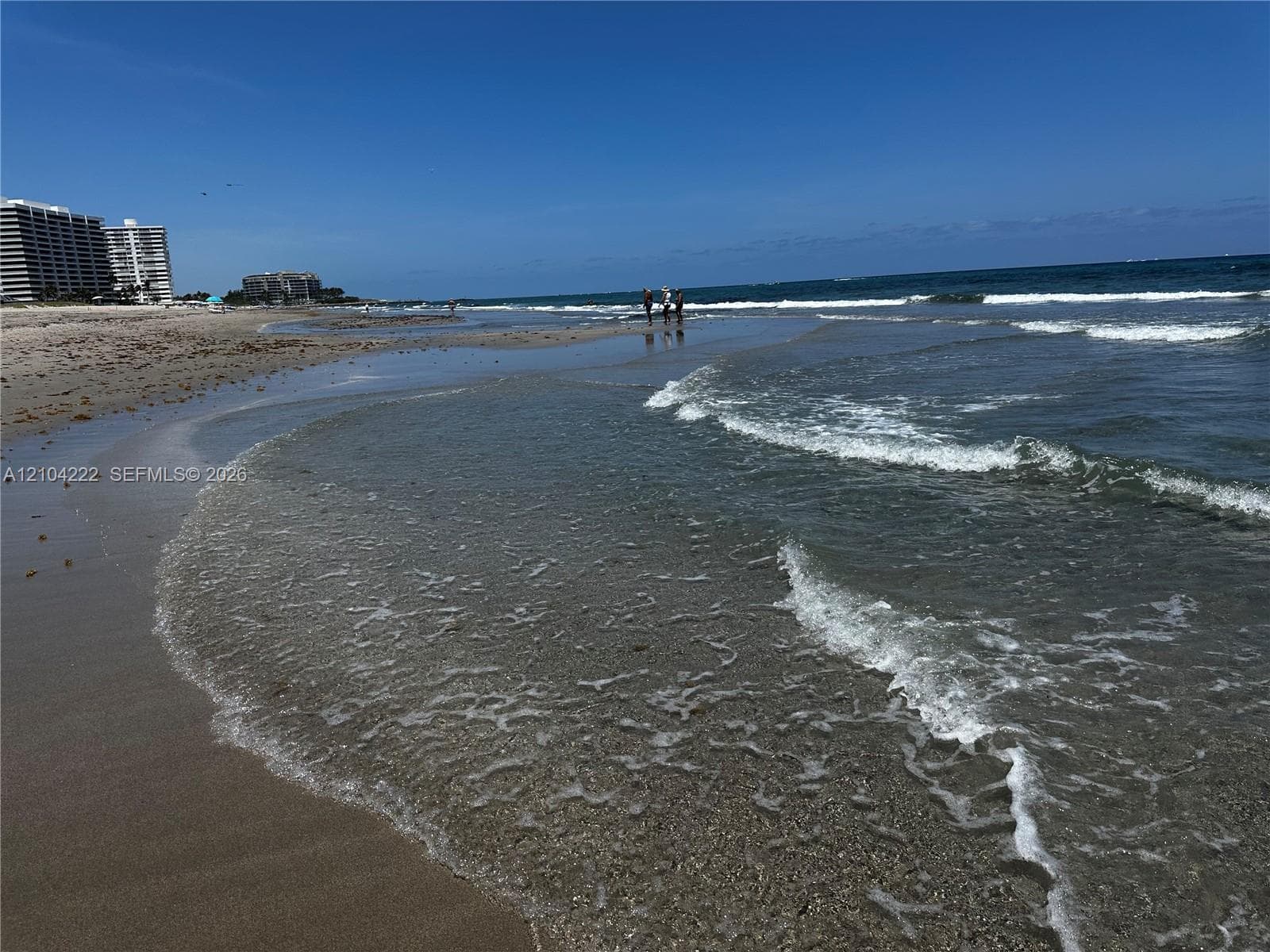 Direct beach access featuring sandy shoreline and ocean waves