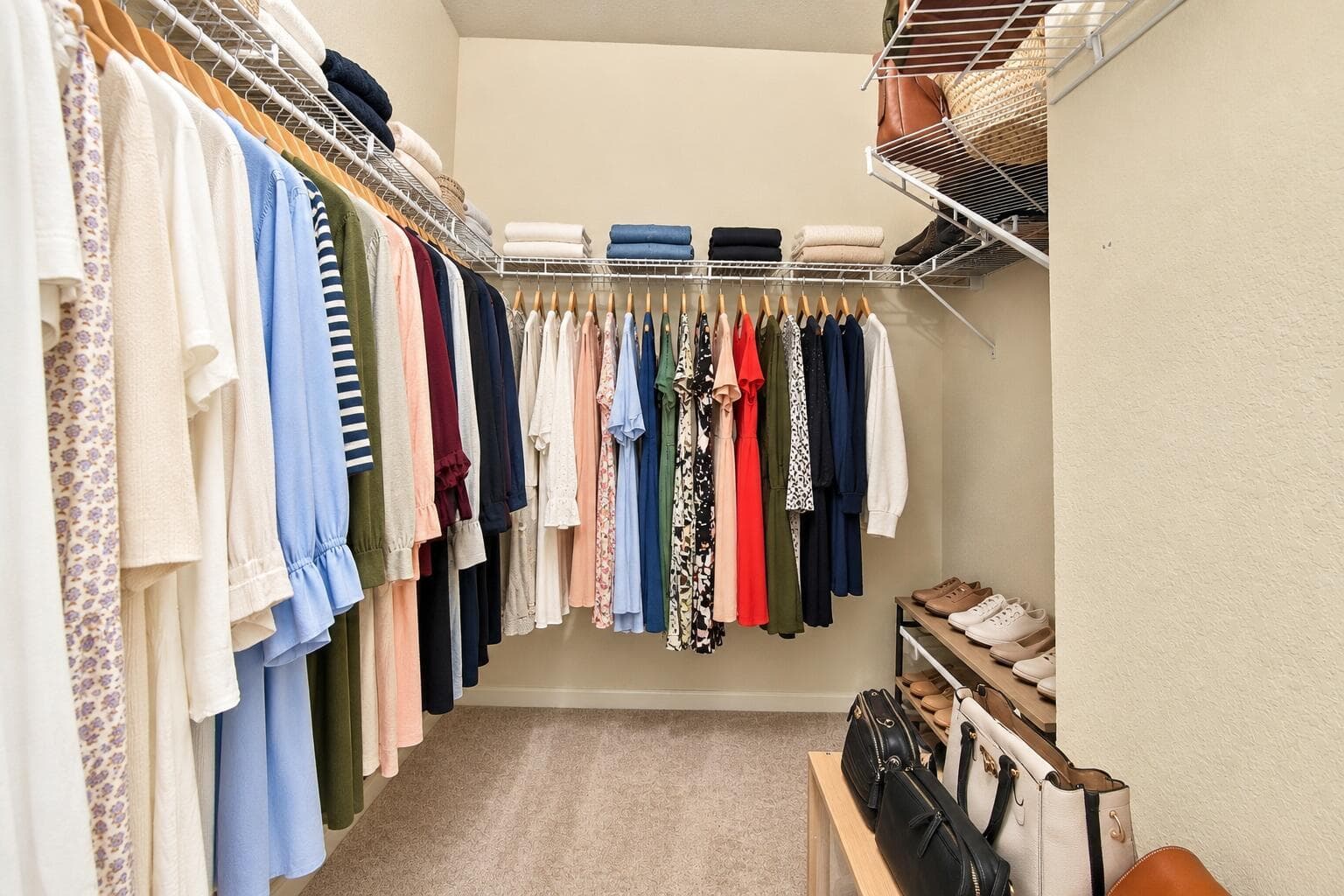 Neatly Staged Walk-In Closet