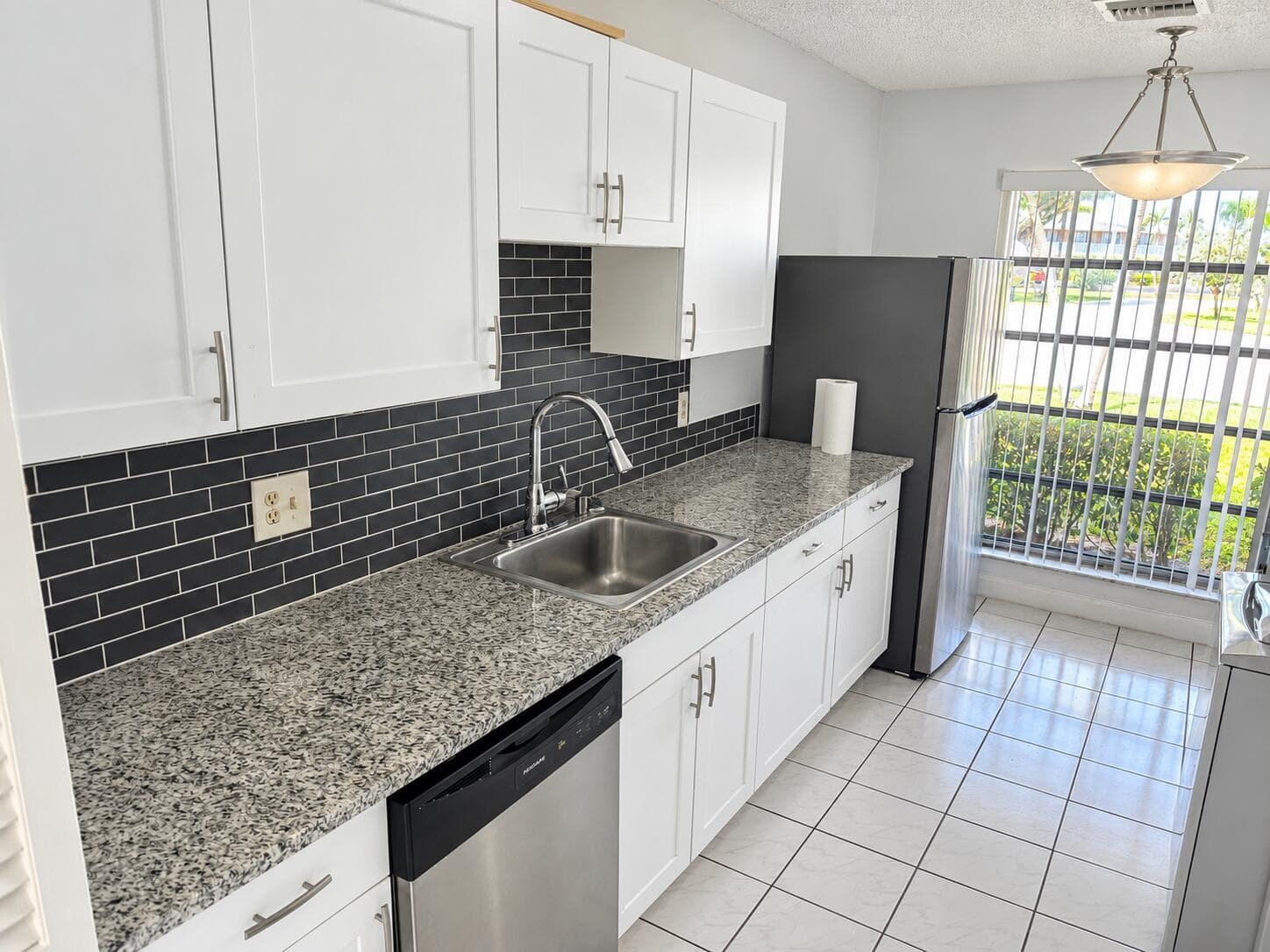 Bright Modern Galley Kitchen with Window