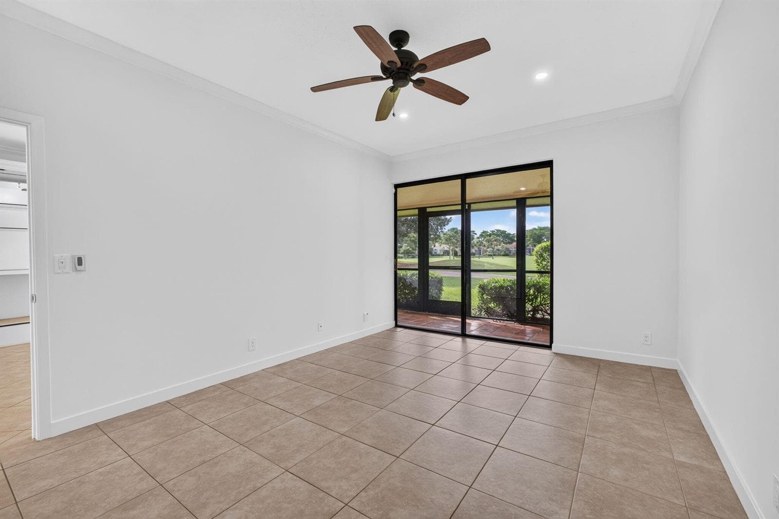 11 - Bedroom with tile flooring