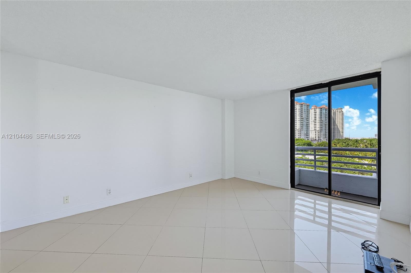 sliding glass door providing access to a private balcony