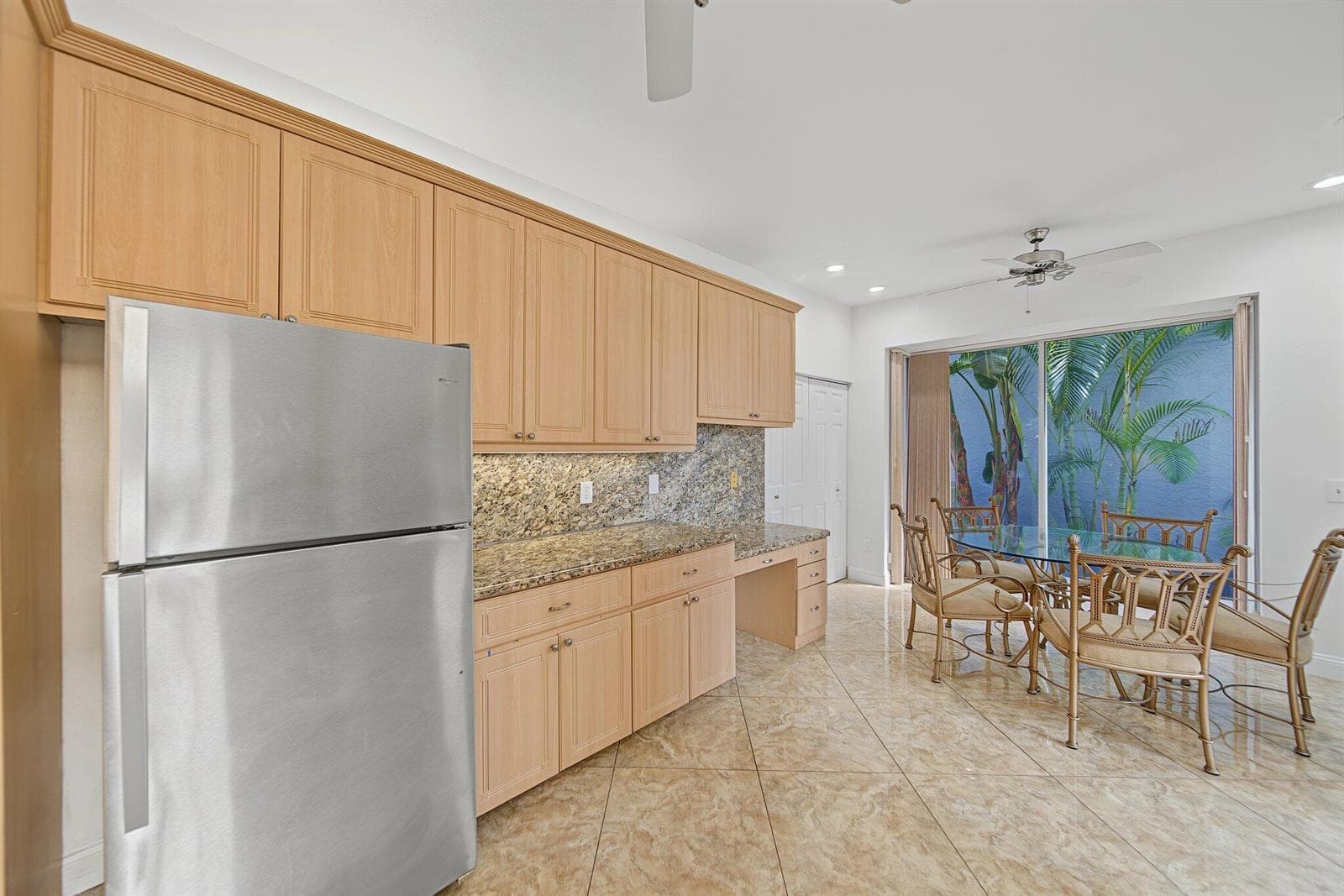 Eat in kitchen overlooking side yard