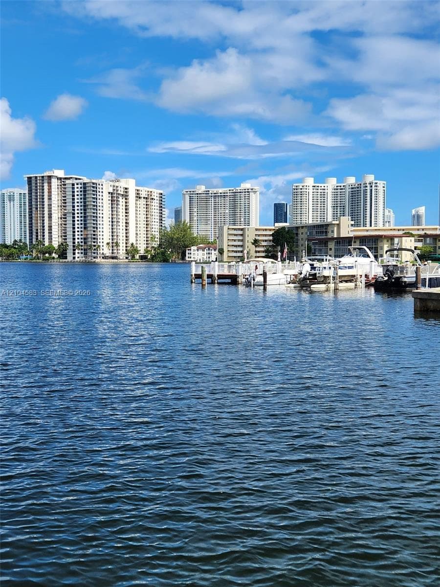 Waterfront location featuring a private boat dock and slip