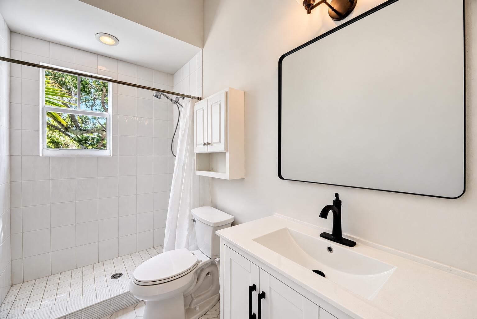 Bright Minimalist Bathroom with Leafy Sh