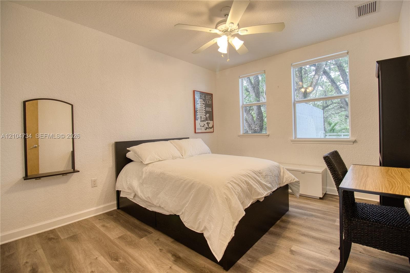Third bedroom, queen bed and WFH station