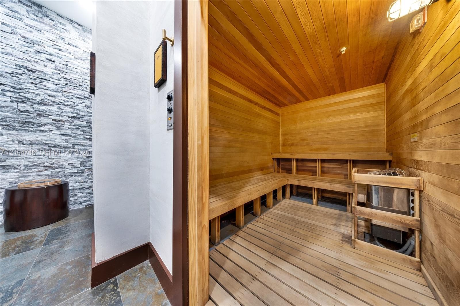 Direct oceanfront access featuring a white sand beach and expansive shoreline