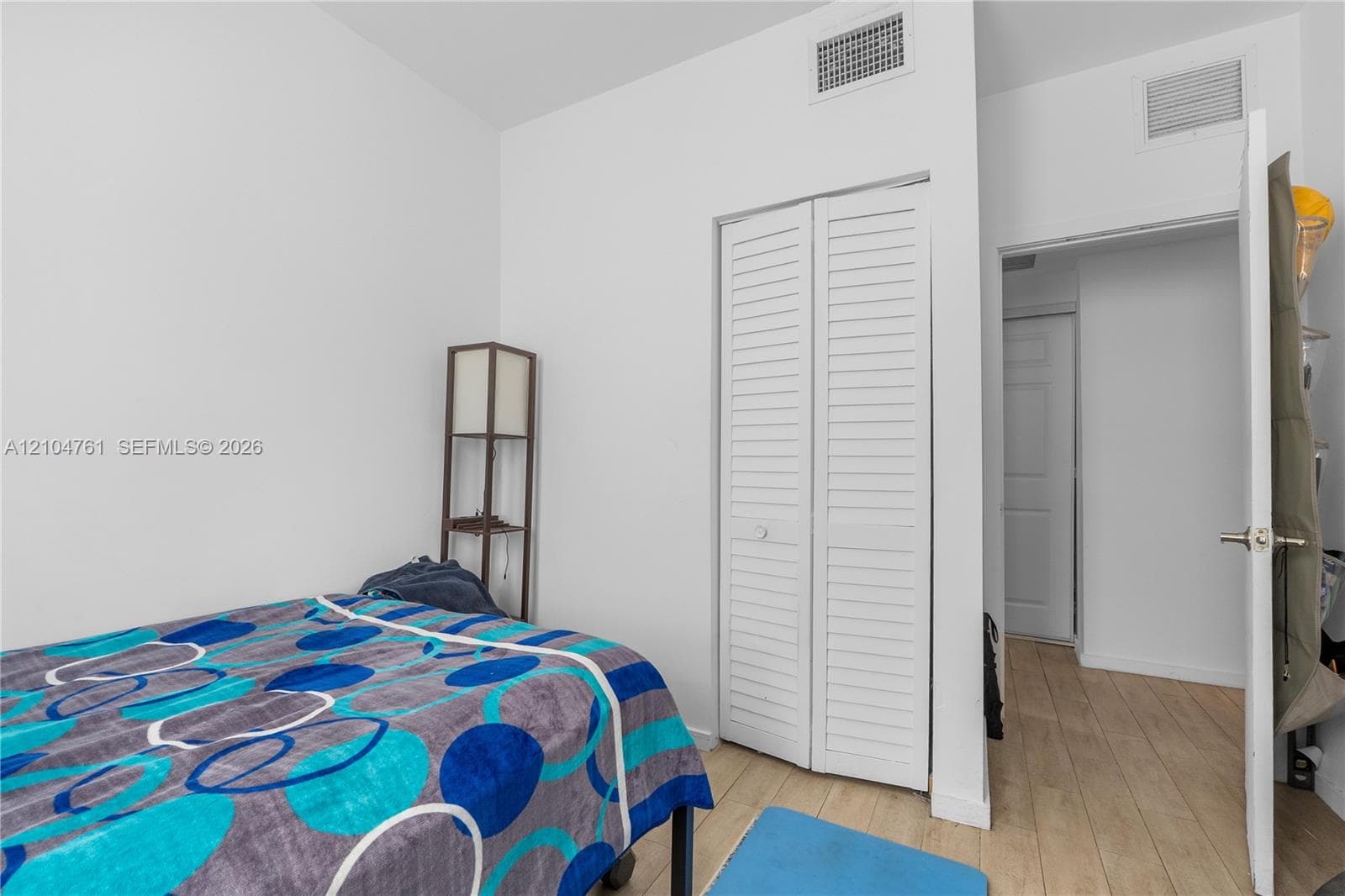 The second bedroom entrance has a large closet across the hallway for tons of extra storage.