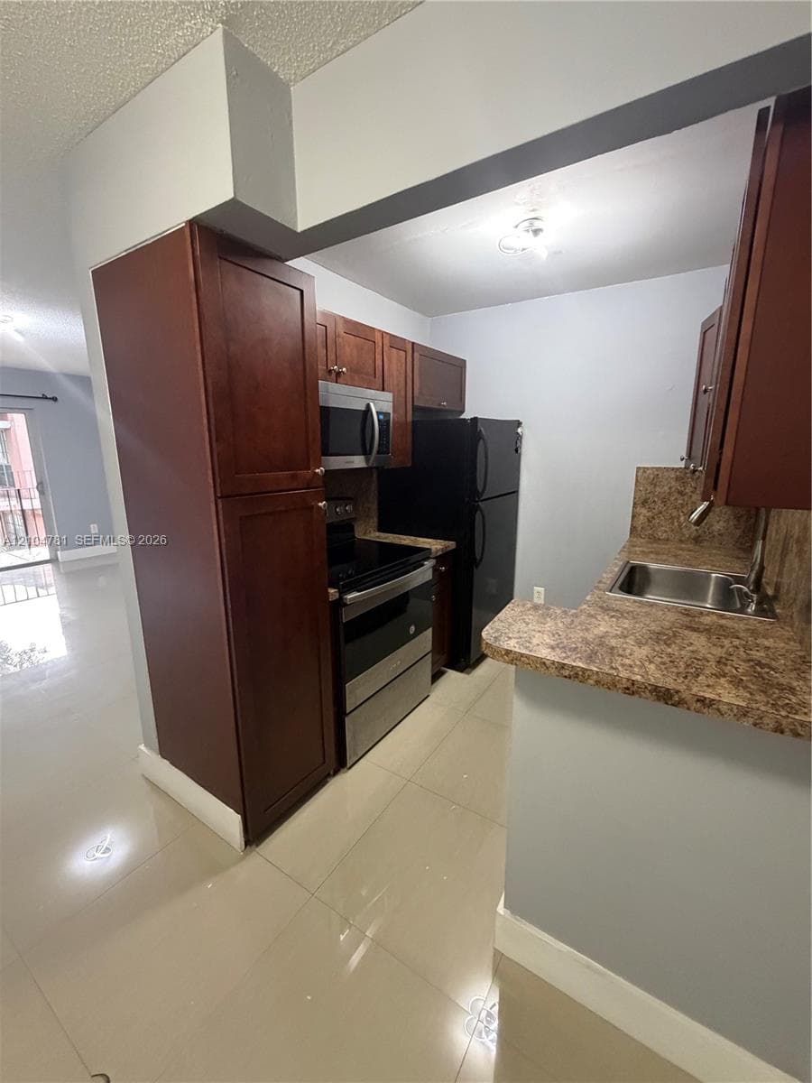 SPANISH TRACE CONDO · #I16 in Miami - Photo 3