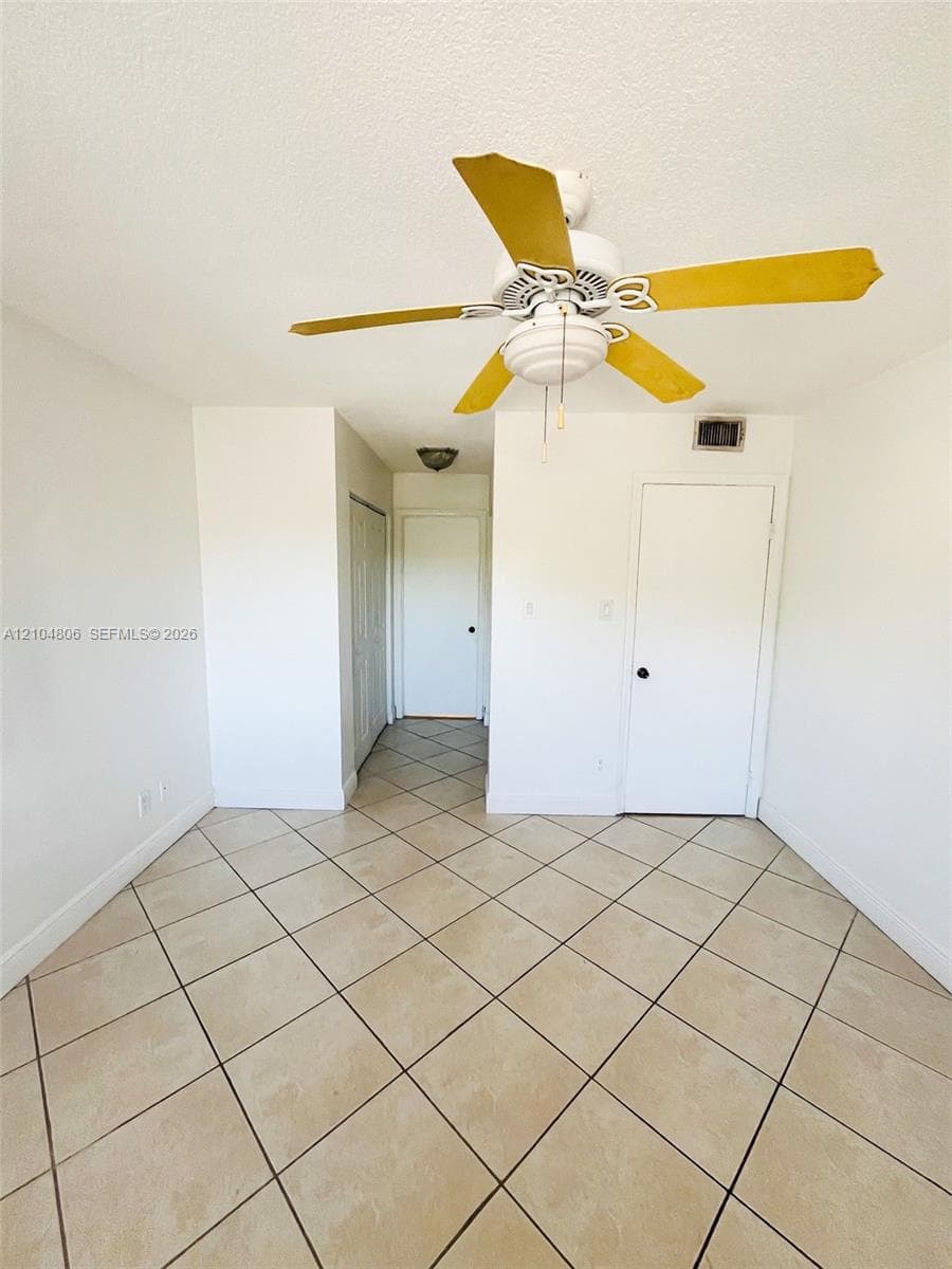 Neutral tone ceramic tile flooring