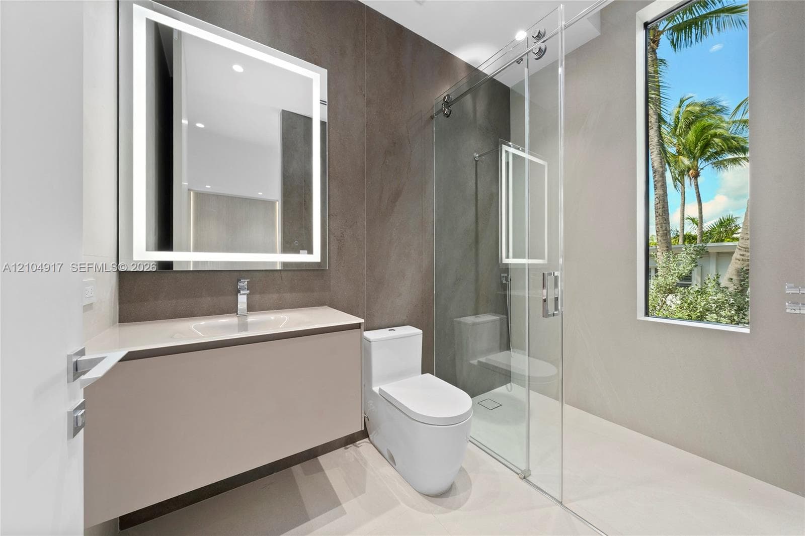 Modern vanity with a recessed sink and sleek faucet