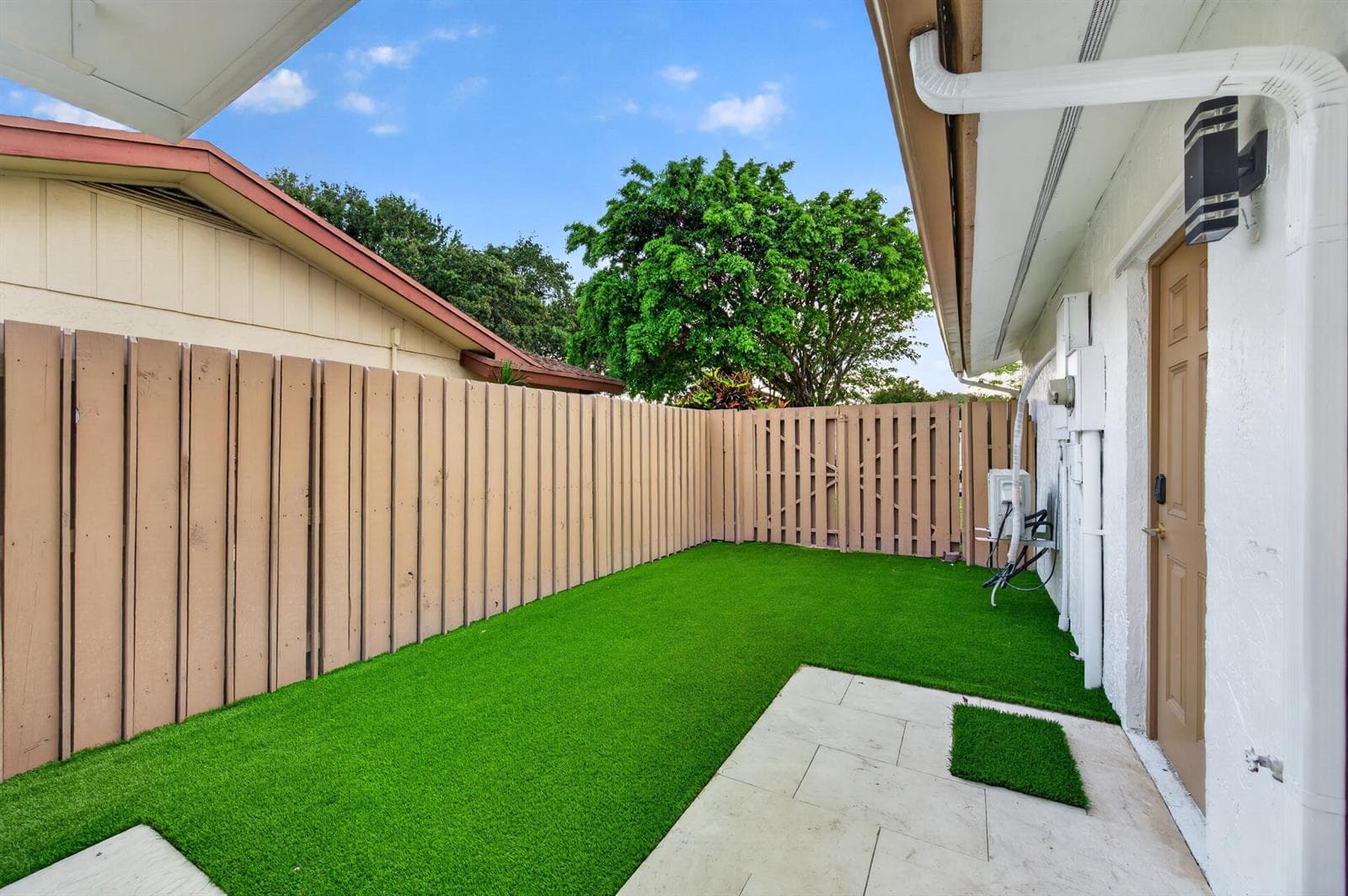 Garage entrance through backyard