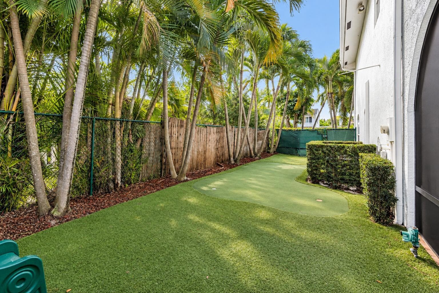 Tropical Backyard Putting Green
