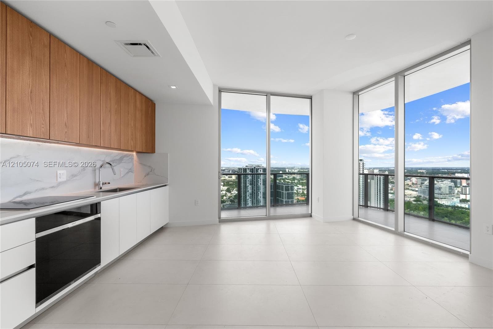 Elevated urban panorama featuring expansive skyline reaches, waterfront proximity, and metropolitan streetscapes