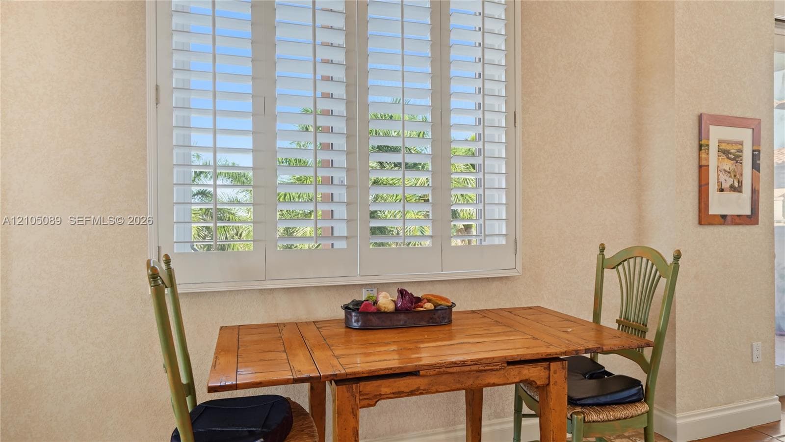 White plantation shutters featuring adjustable louvers