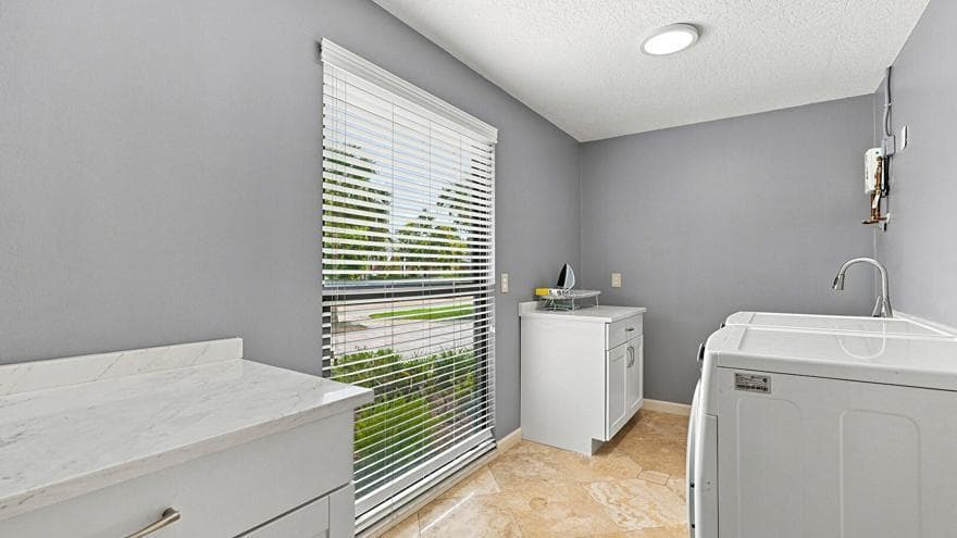 Laundry off Of Kitchen & Garage