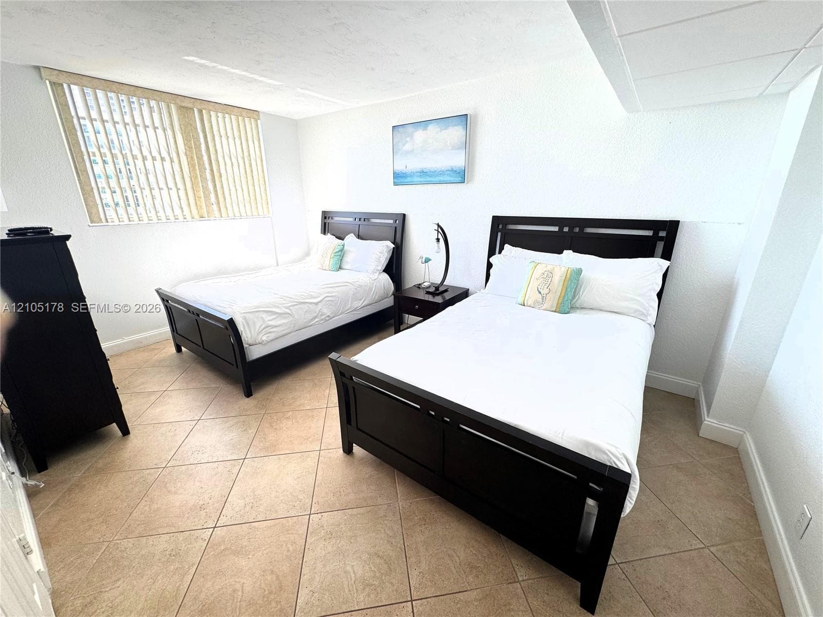 guest bedroom with 2 FULL beds