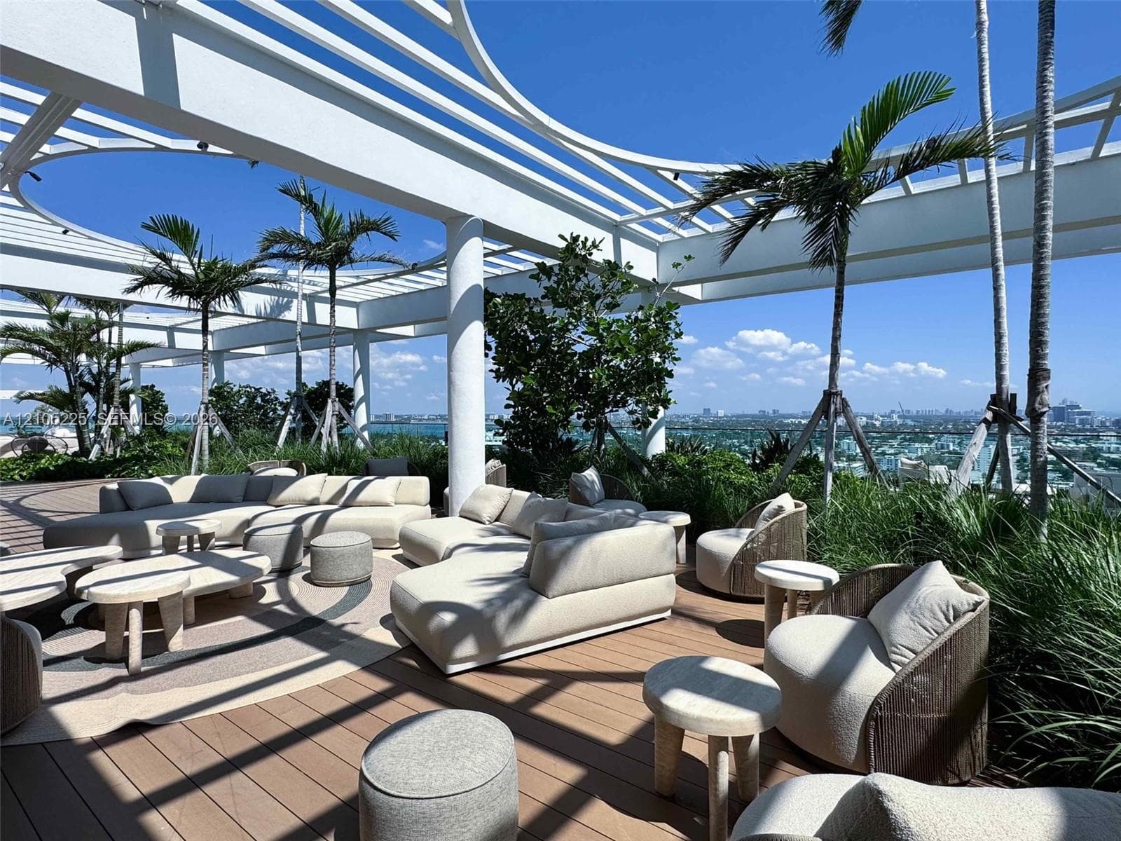 Rooftop terrace with slatted pergola, wood-finish decking, and integrated landscaping