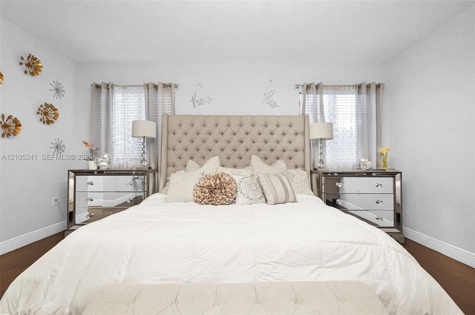 Tufted upholstered headboard with winged sides