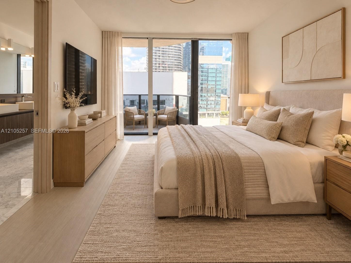 Floor-to-ceiling glass sliding doors opening to a private balcony, light-toned wood-finish flooring, and recessed ceiling lighting