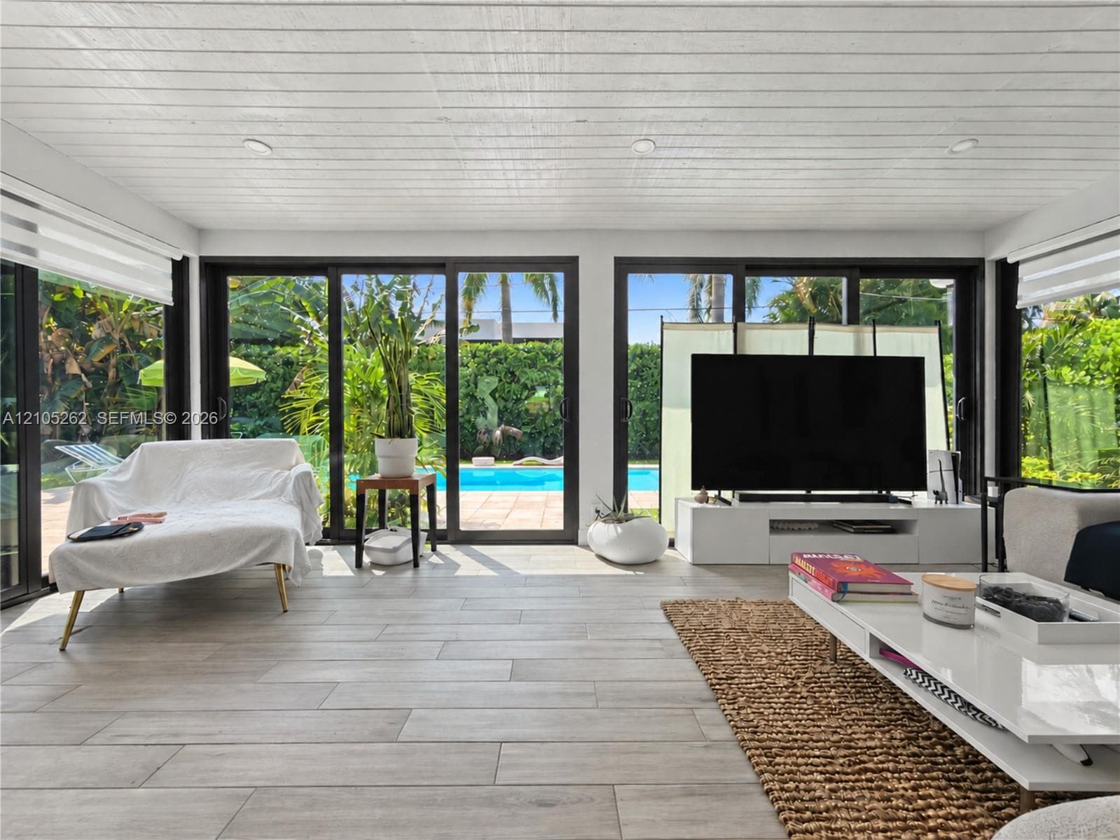 Wood-finish plank flooring throughout