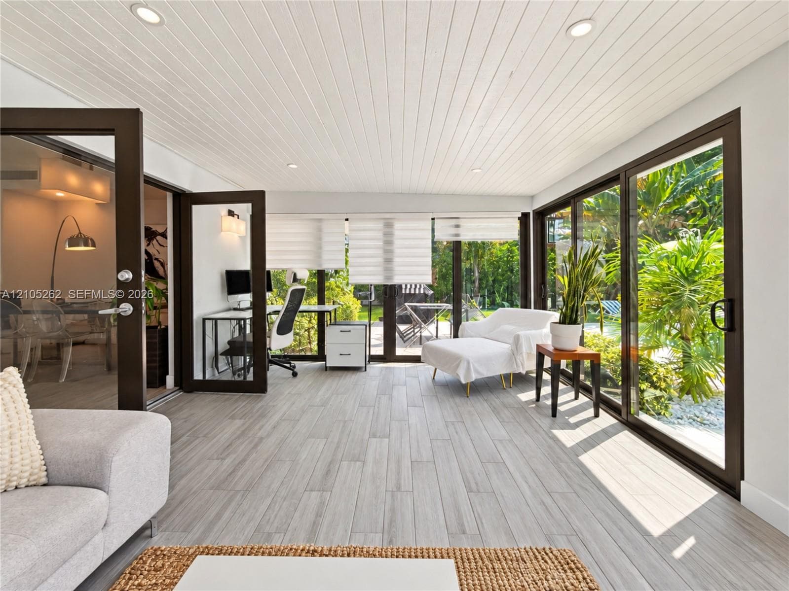 Wood-finish plank flooring throughout