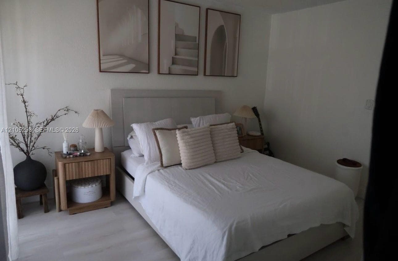 Wood-finish flooring with crisp white walls