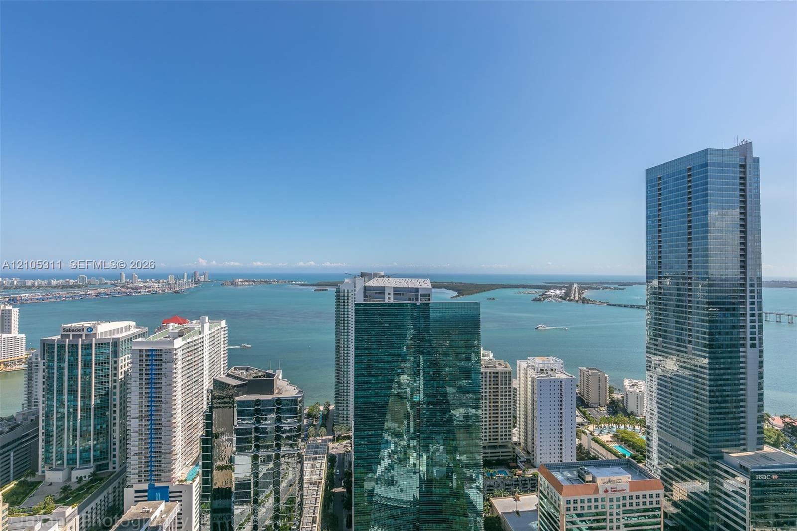 Skyline with prominent high-rise buildings and expansive water scenery