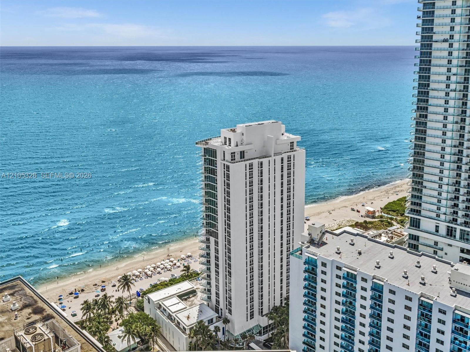 Experience luxury oceanfront living at Apogee Beach, featuring direct beach access, resort-style pools, and amenities, and exceptional coastal lifestyle.